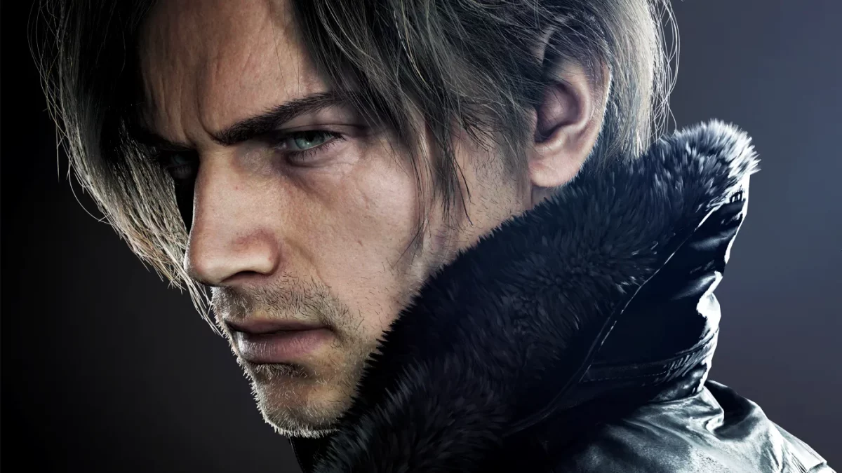 Close do perfil de Leon S. Kennedy em Resident Evil, destacando seu olhar sério, cabelo loiro característico e a gola de pele de sua jaqueta clássica contra um fundo escuro.